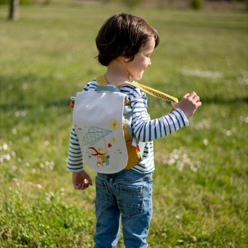 Mochila ala delta color blanco y amarillo personalizada con el nombre del niño 