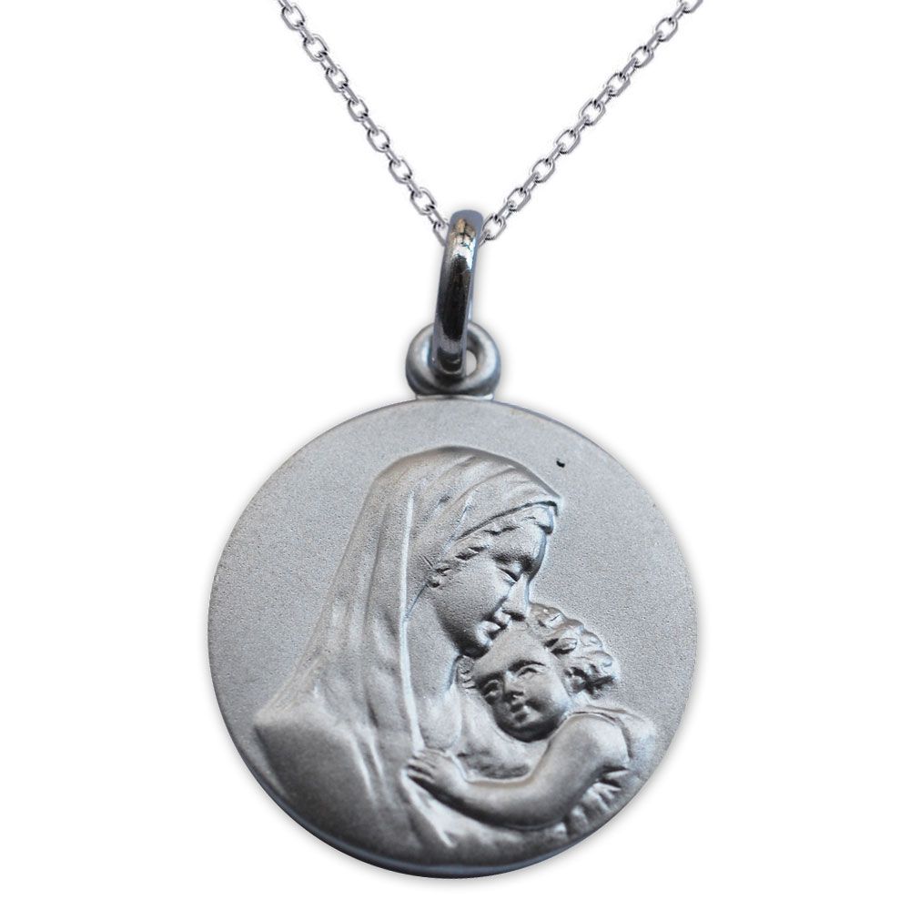 Medalla de la Virgen y el Nio en plata maciza grabada